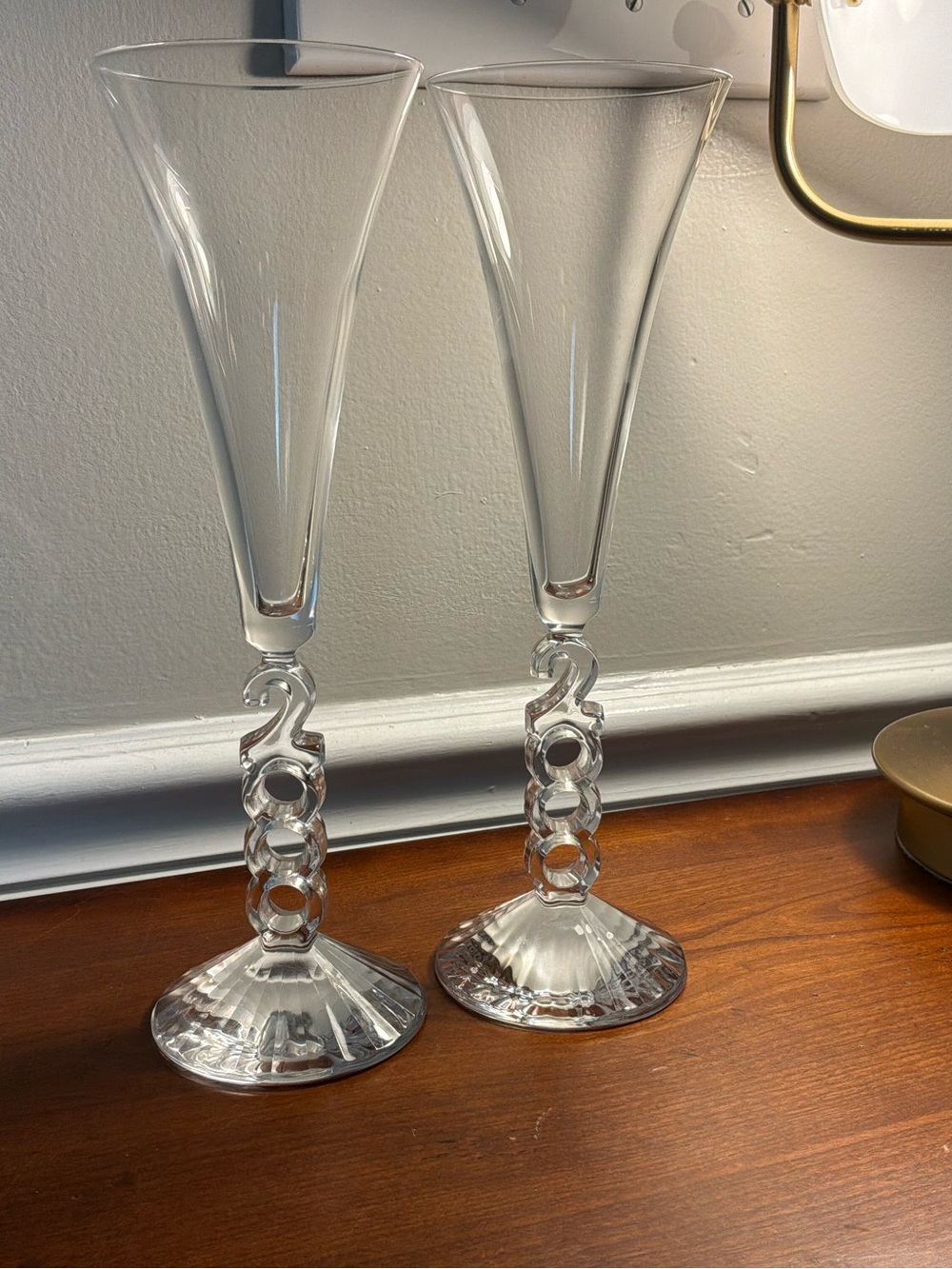 Two Cristal D’Arques Clear Champagne Flutes with Sculpted Loop Stem from 2000